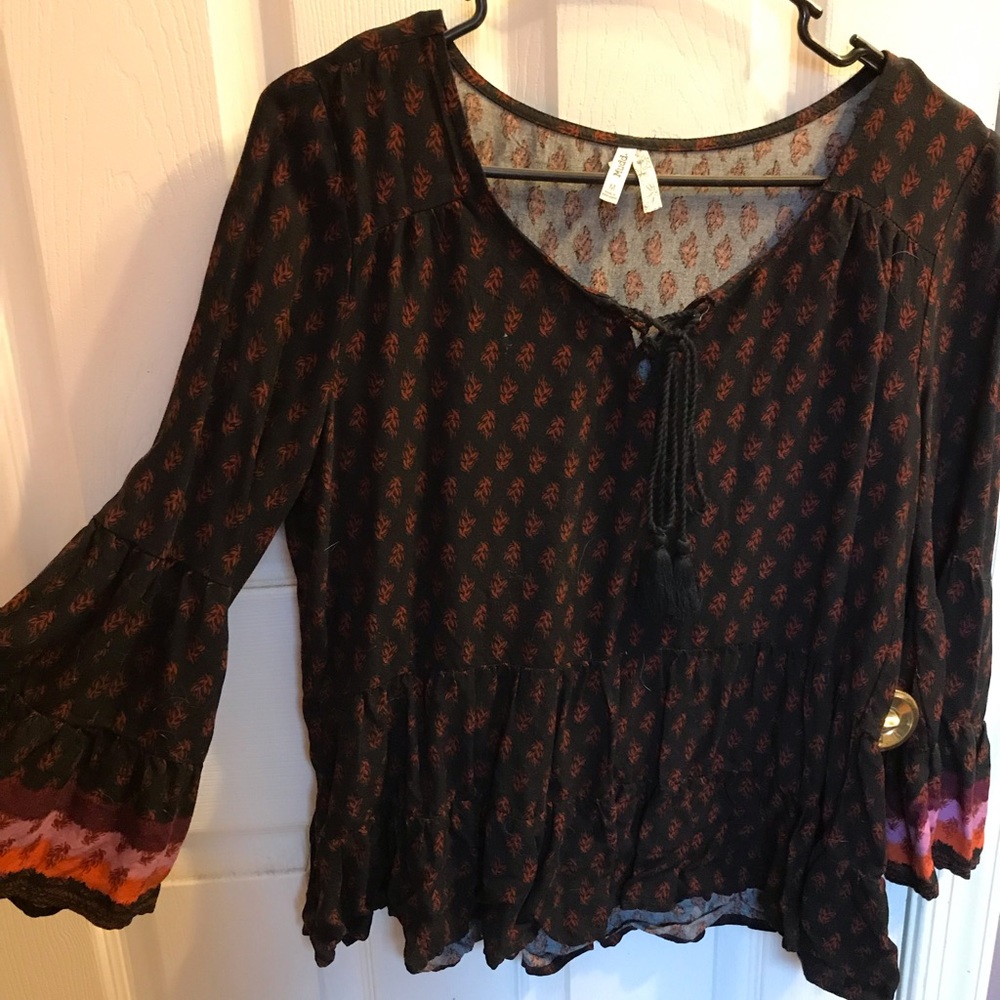 Cute fall flare sleeved blouse.